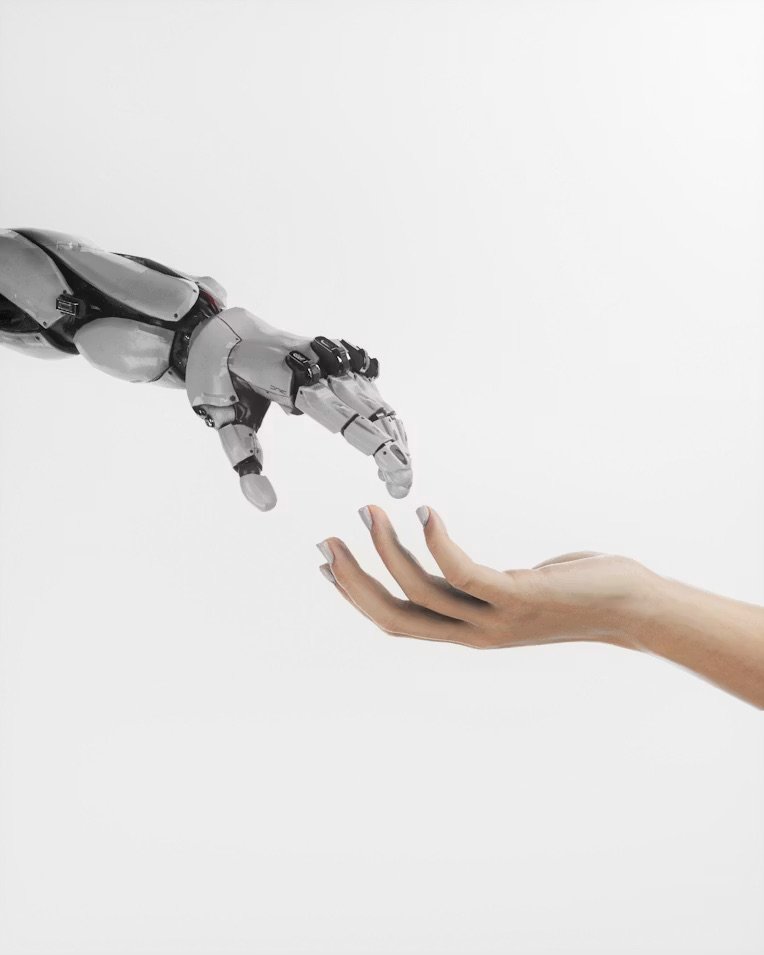 A robotic hand and a human hand reaching toward each other